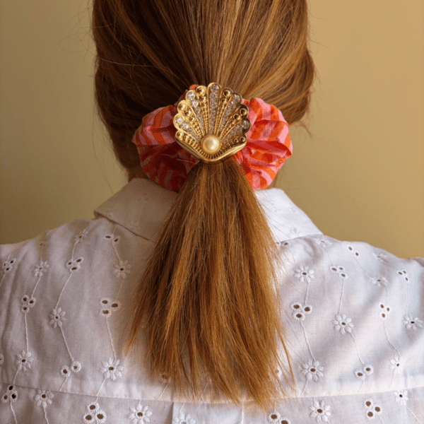 Clip Vénus doré strass