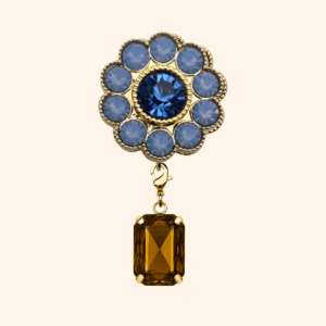 Bijou de bouton fleur de fraisier bleu & sa pampille cabochon cognac